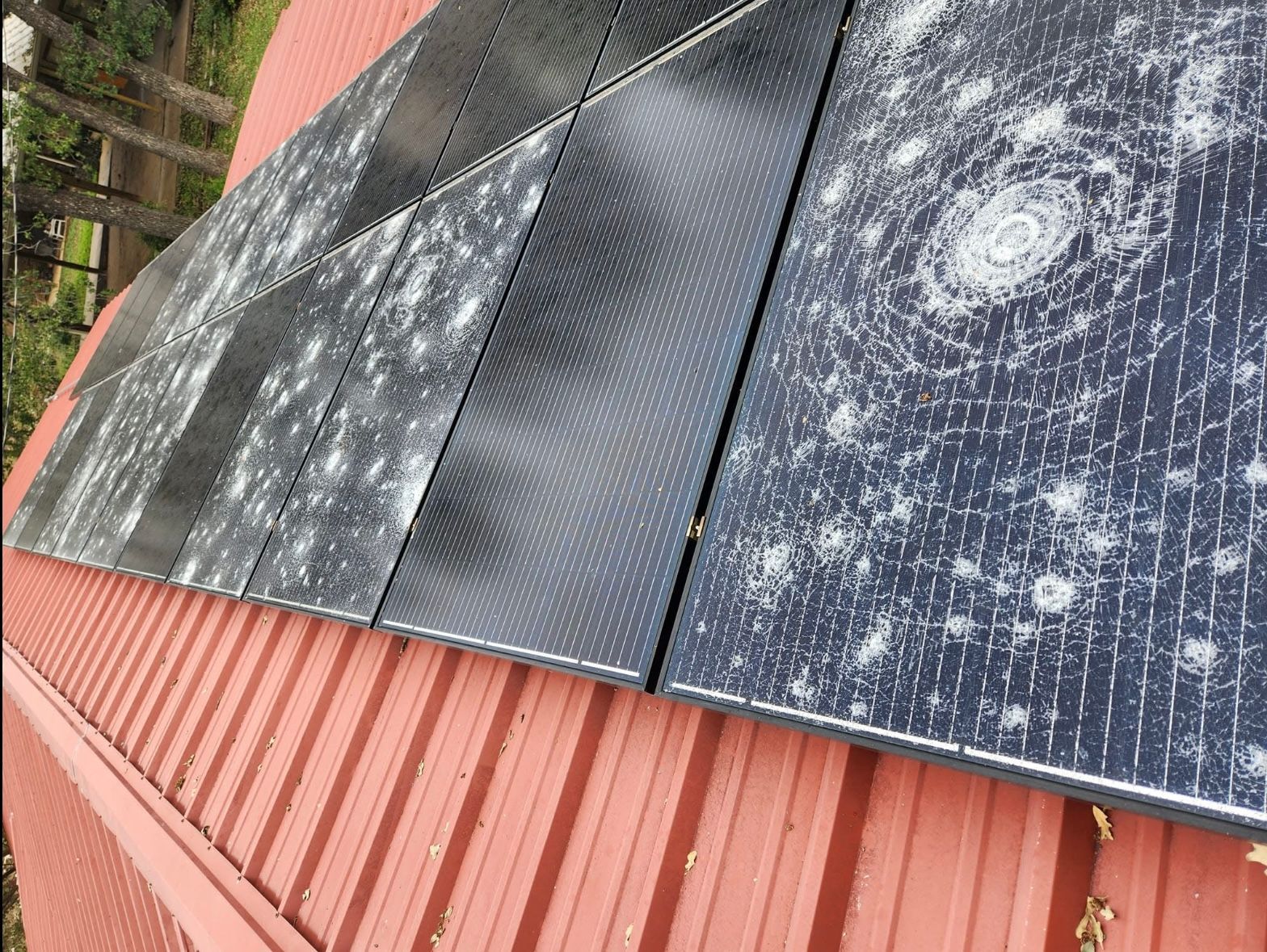 Professional deck construction project featuring elevated balcony and sturdy wood platform beside a lake.