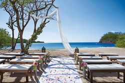 dreams las mareas A wedding ceremony is taking place on the beach.