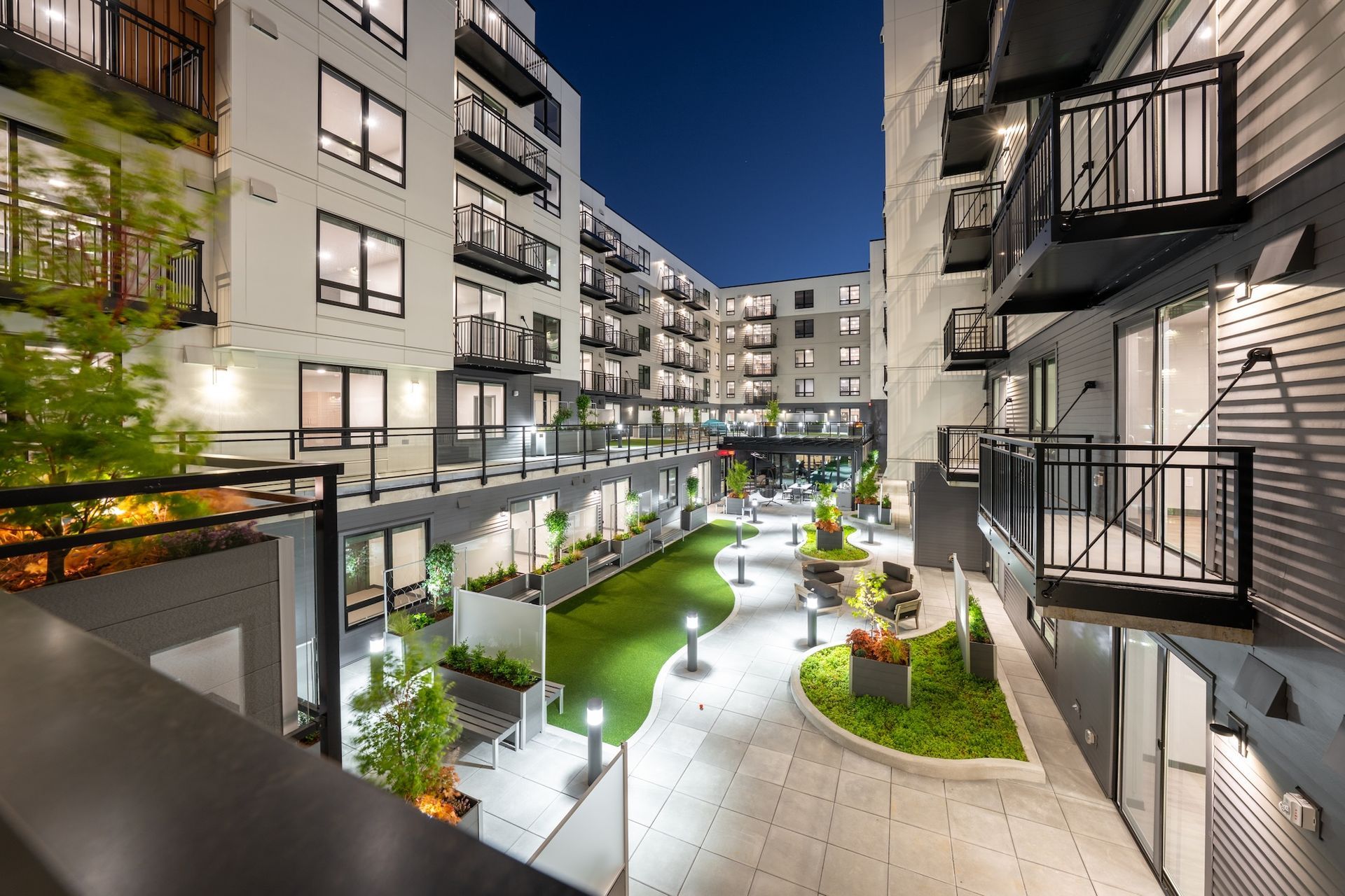courtyard at night with walking paths