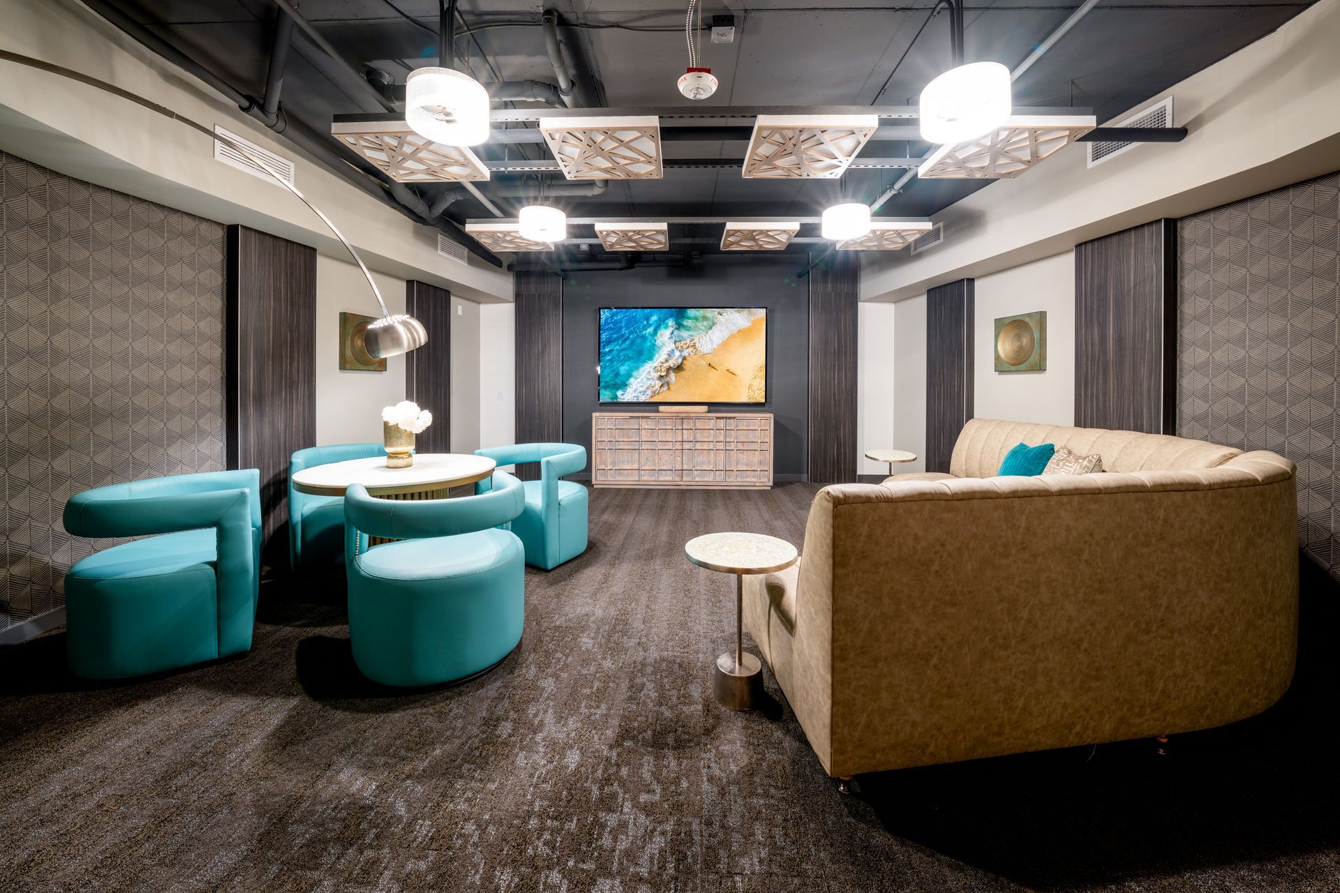 theatre room with blue table and chairs