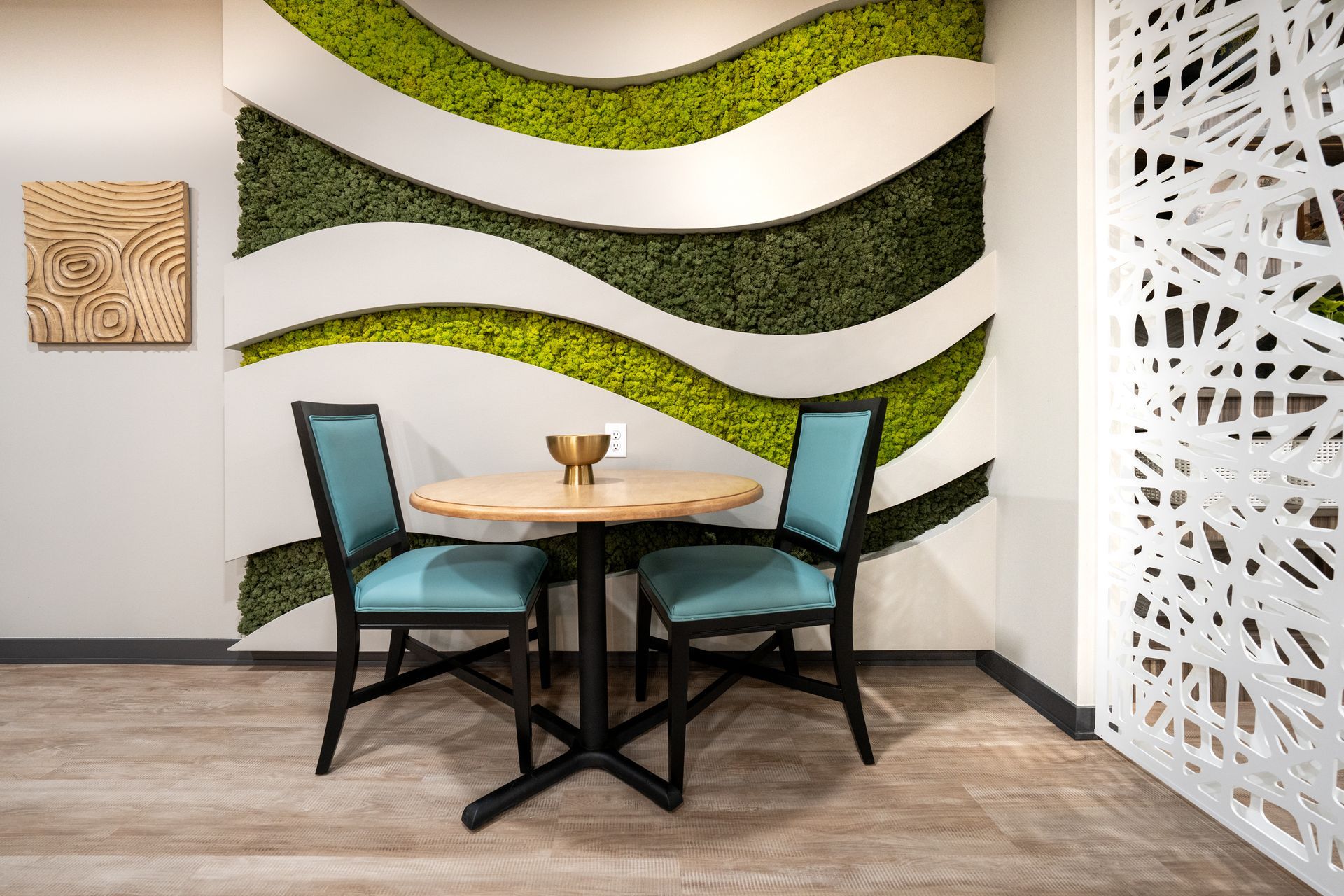 sitting area with living plant wall