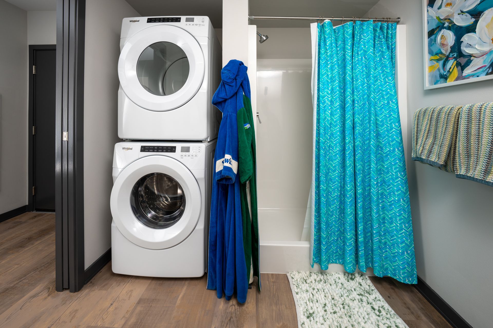 bathroom with washer and dryer