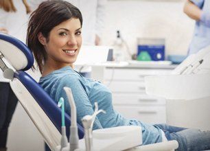 smiling lady in dental chair