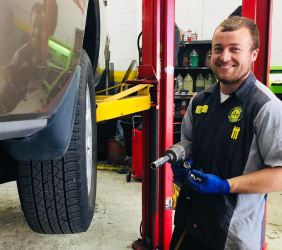 Our Technician Checking Tire in Redwood City, CA - A+ Auto Repair of Redwood City