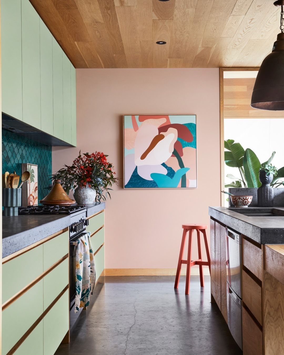 Professionally Painting a wall with a Vibrant Green Colour — Painters in Cessnock, NSW