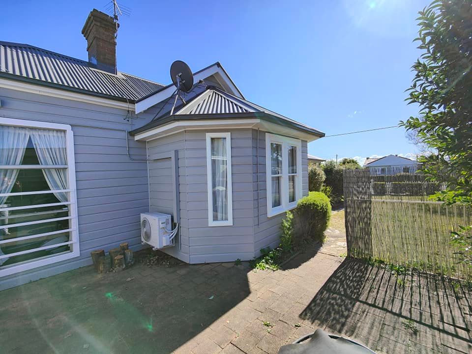 The Exterior of the House Being Painted — Painting Services in the Hunter Valley, NSW