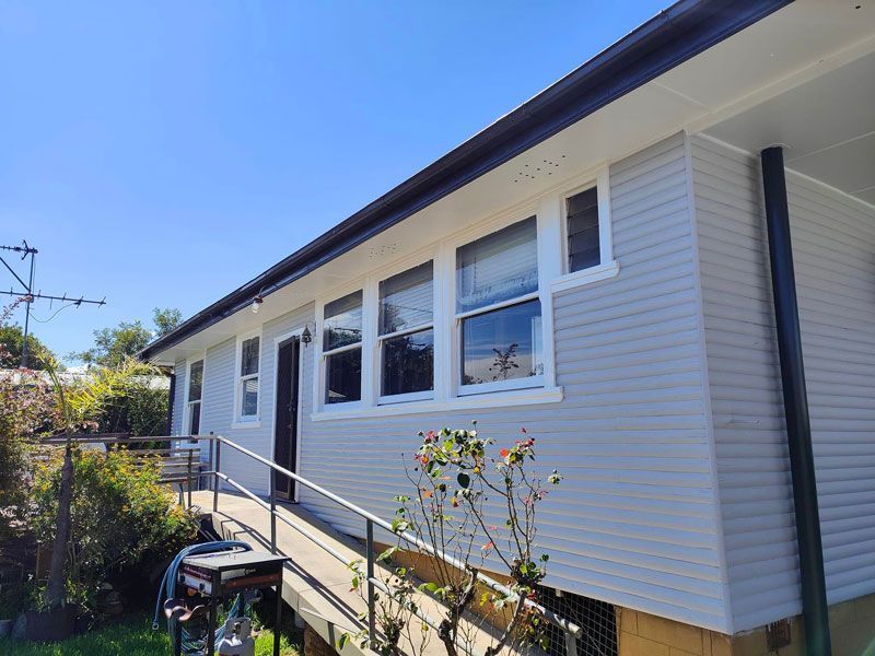 Elevate Your Home's Exterior with Professional Wooden House Painting Services — Painters in Scone, NSW