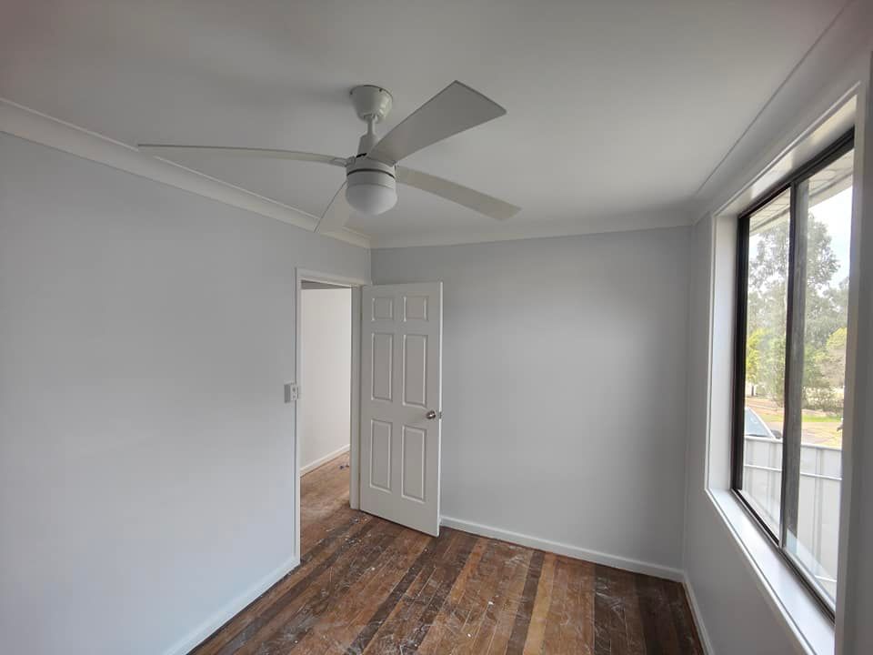 Interior of a House Painted in Elegant Grey with a Ceiling Fan — Interior Painting in the Hunter Valley, NSW
