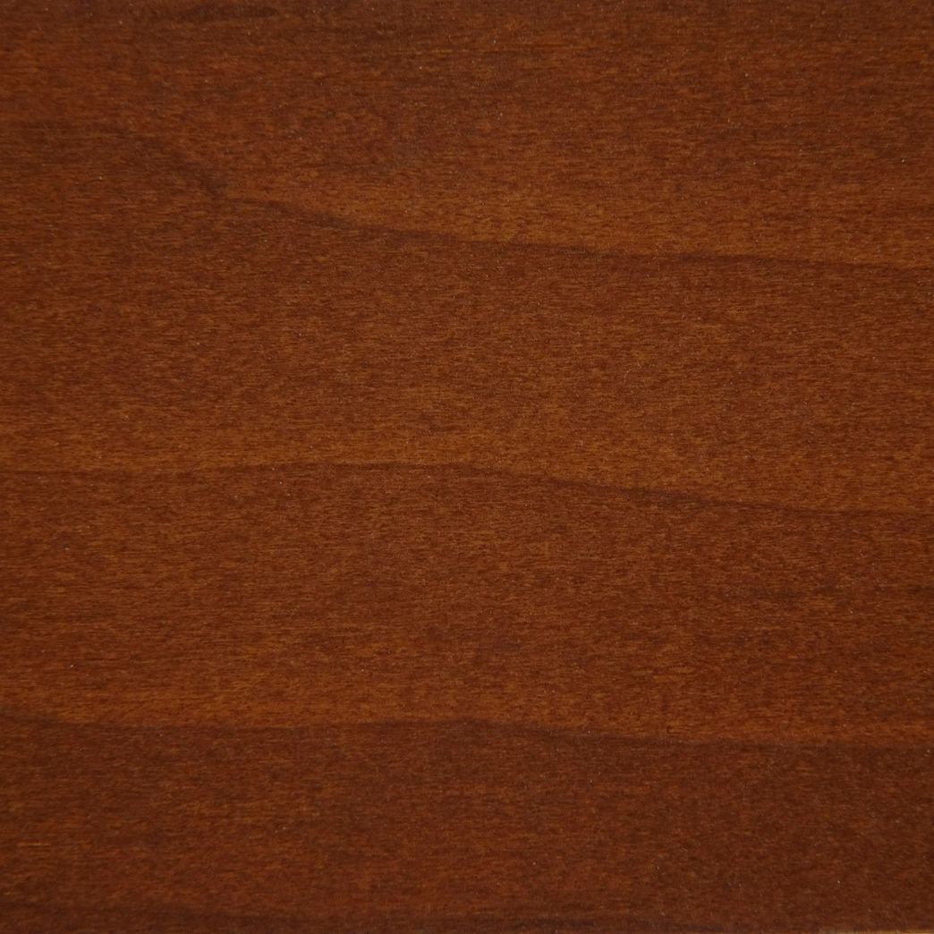 A close up of a piece of brown wood.