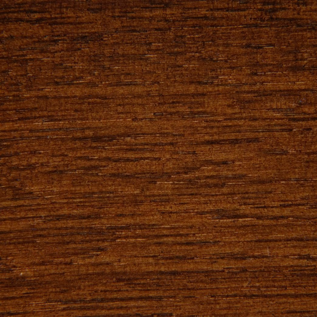 A close up of a brown wood grain texture.