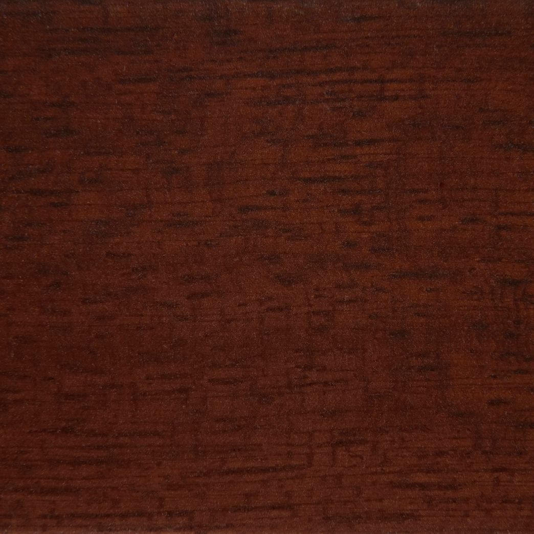 A close up of a piece of brown wood.