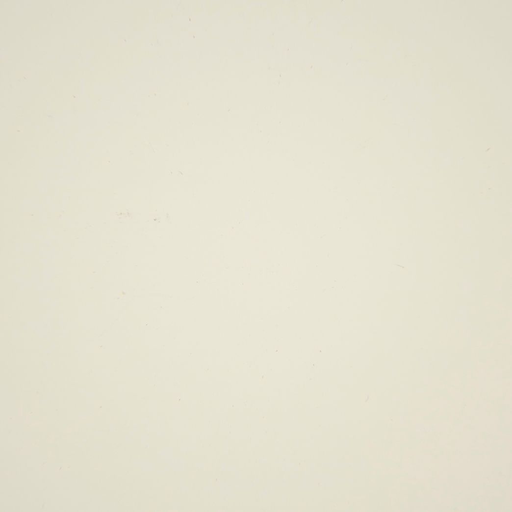 A close up of a white paper texture.