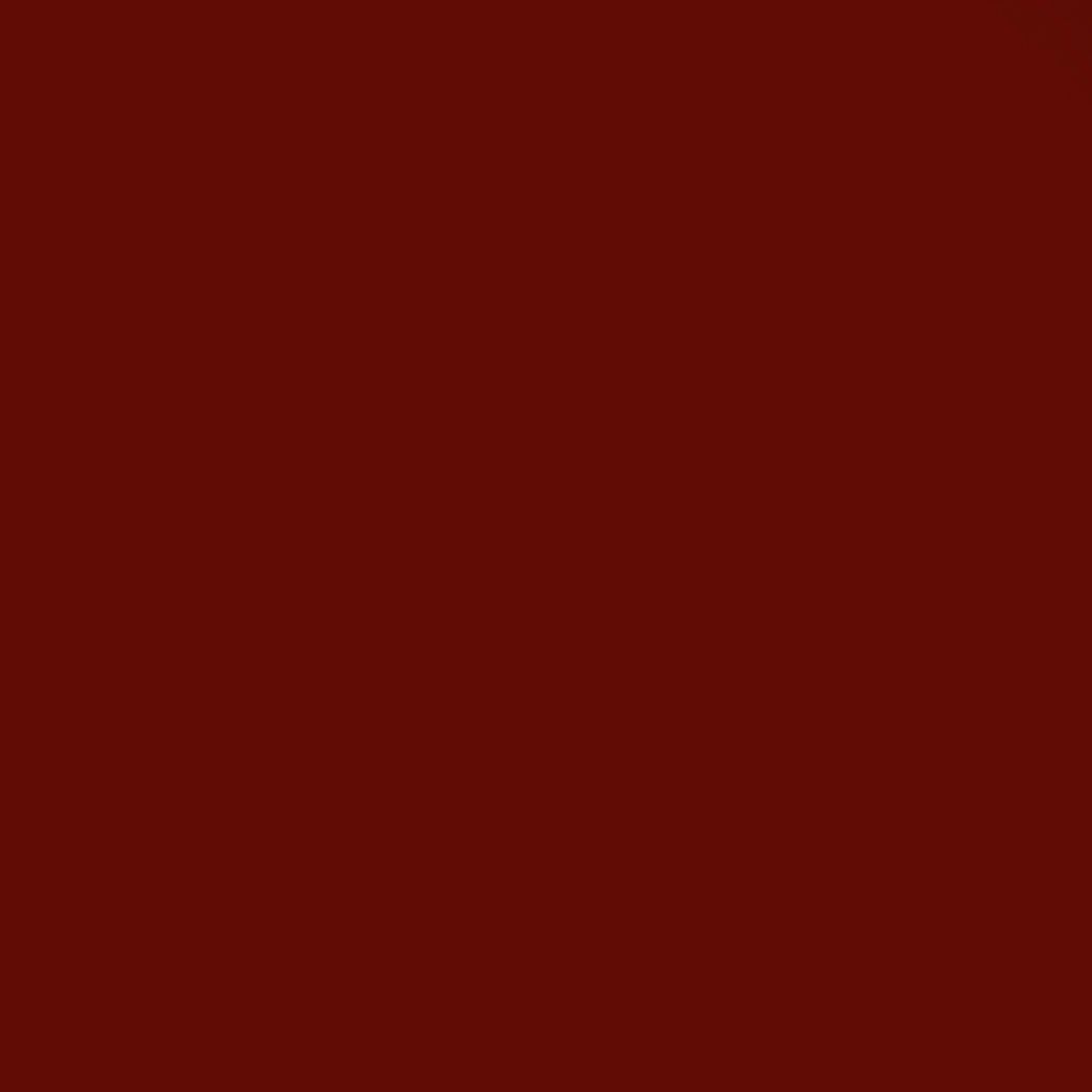 A close up of a dark red background.