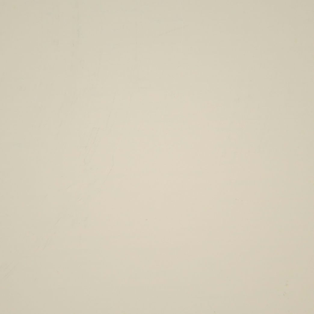 A close up of a white paper texture.