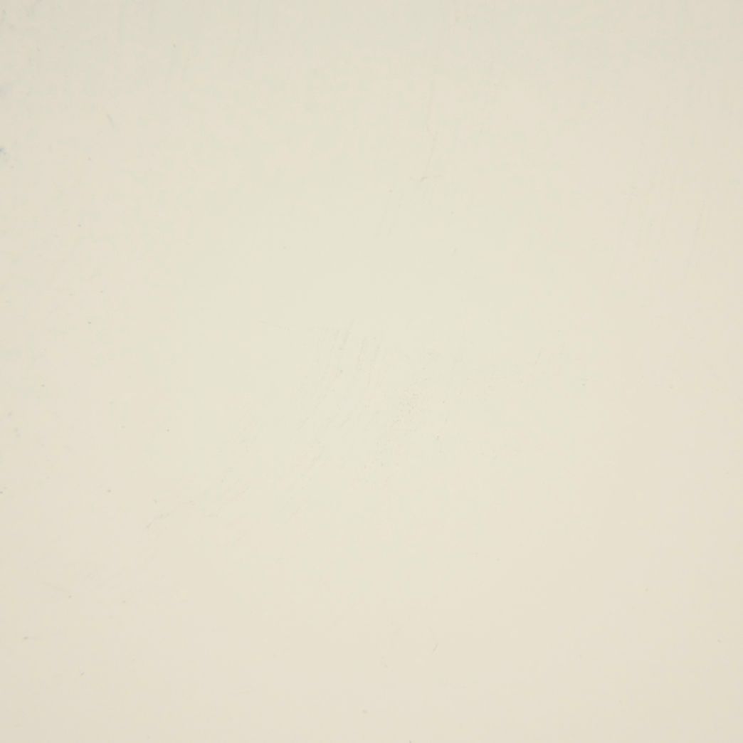 A close up of a white paper texture.