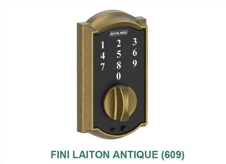 Une photo d'une serrure de porte antique en laiton fini