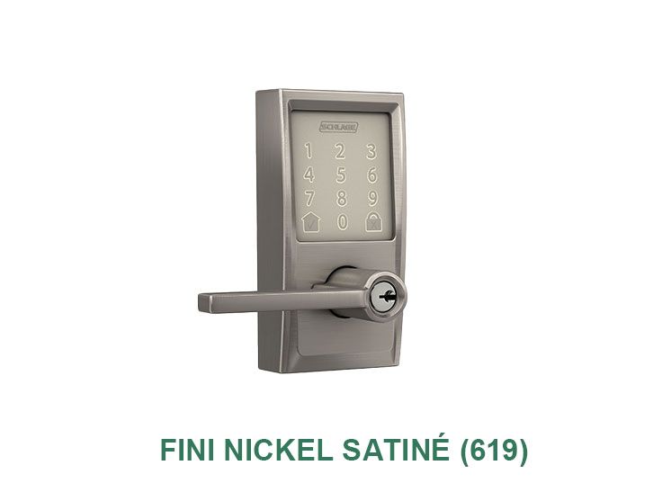 Une serrure de porte noire avec une poignée et une clé sur fond blanc.