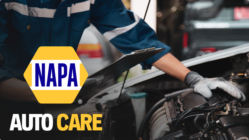 NAPA Auto Care mechanic working under a car in a repair shop | Gil's Auto & Truck Repair