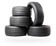 Stacked black car tires, with one tire leaning upright on top, on a white background | Gil's Auto & Truck Repair