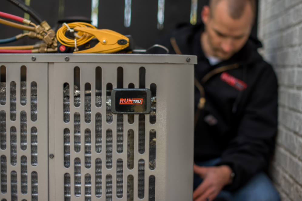 Man Fixing — Concord, NC — Concord Heating & Air Conditioning Inc