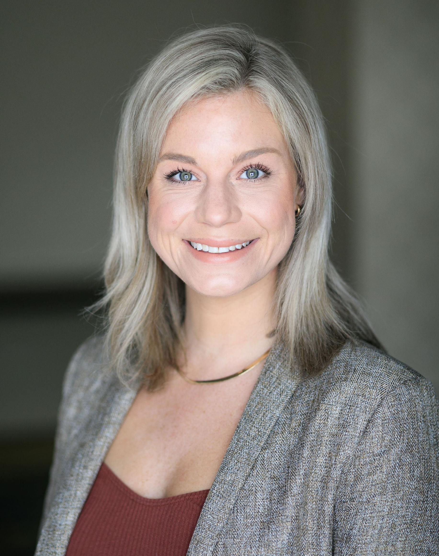 Blurred office background headshots for a more modern look.