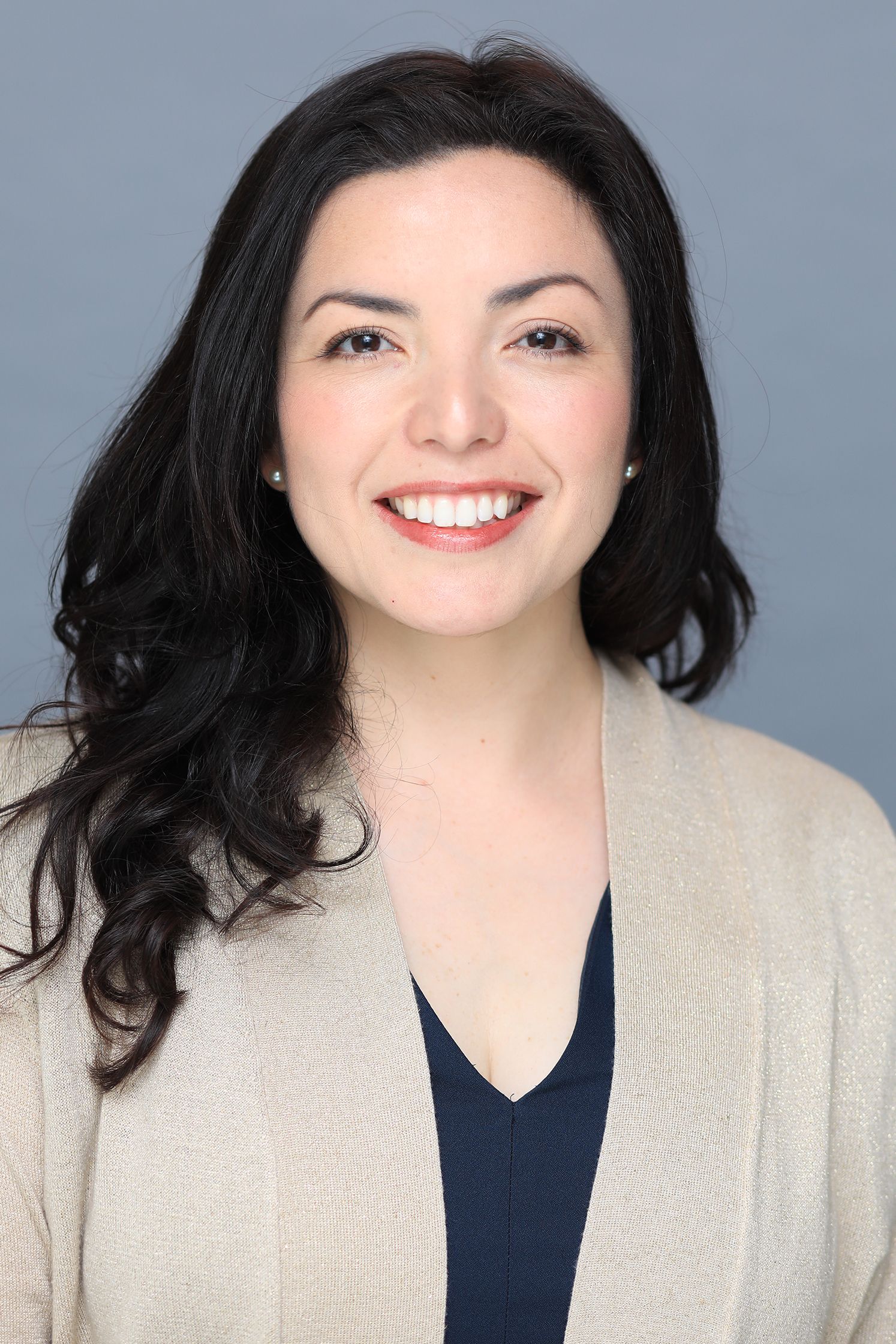 business headshots in studio grey background