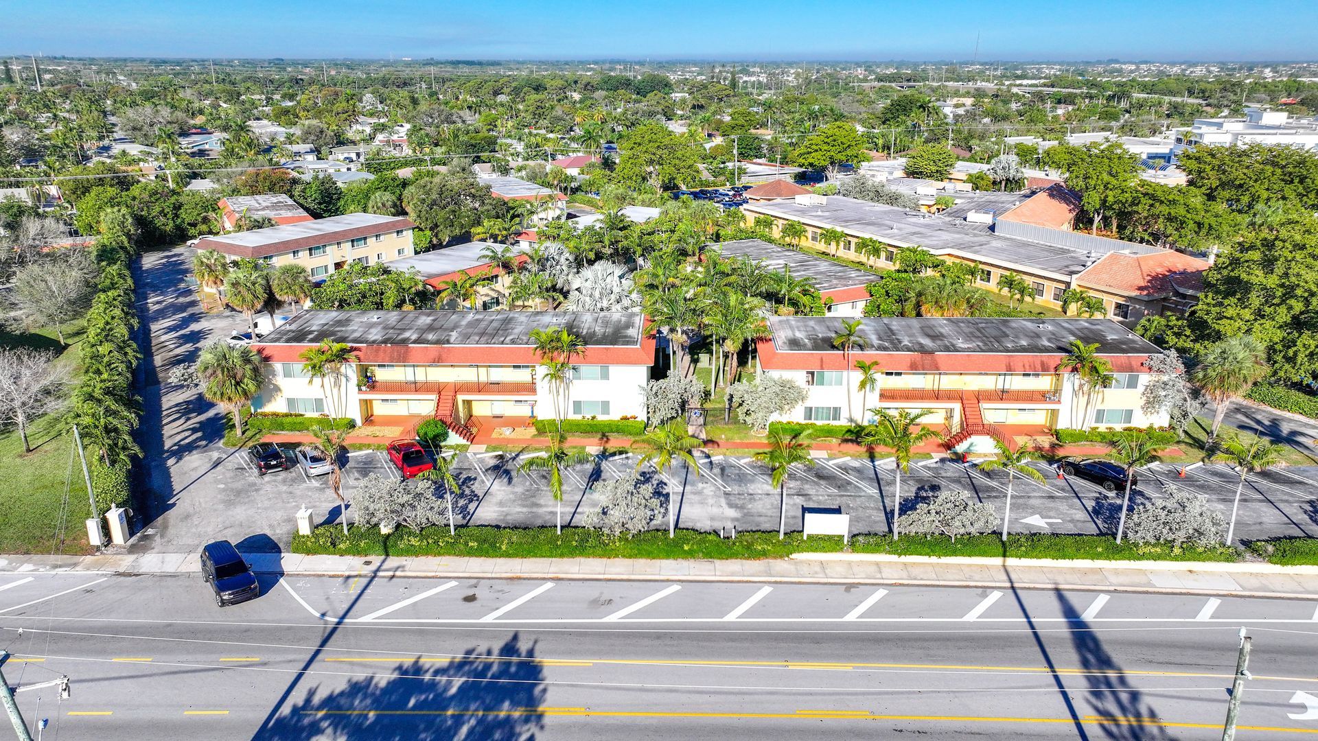 Photo of the apartment complex seen from a bird's eye point of view - shown from the street