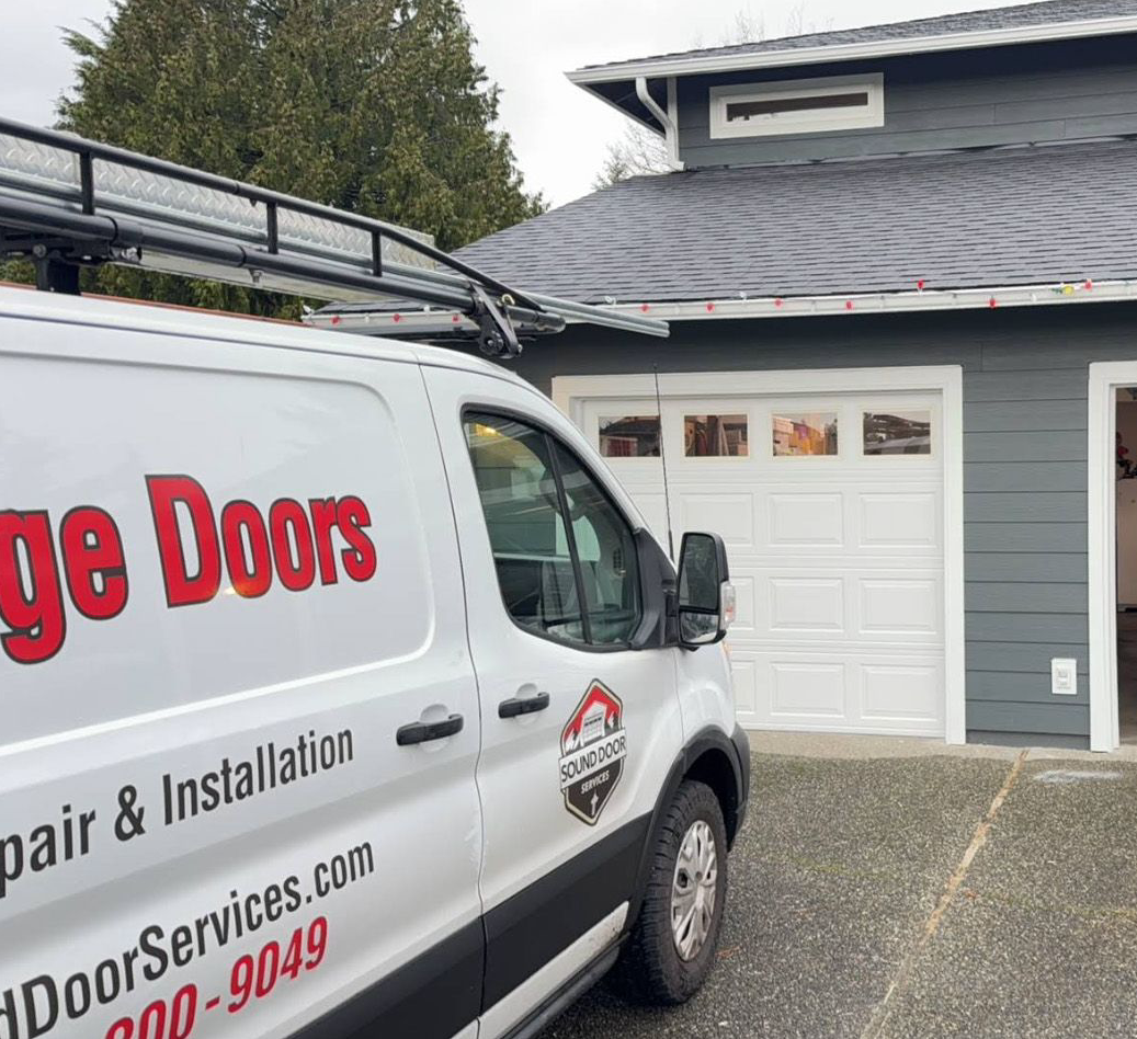 A white service van labeled 
