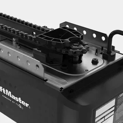 A close-up of a LiftMaster garage door opener motor, featuring a black chain drive mechanism and metal mounting brackets.