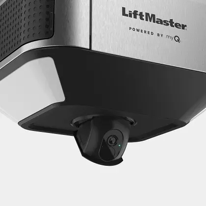 A LiftMaster garage door opener unit featuring an integrated, downward-facing security camera.