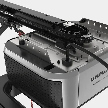 A close-up of a LiftMaster garage door opener motor unit and its connected rail assembly against a plain background.