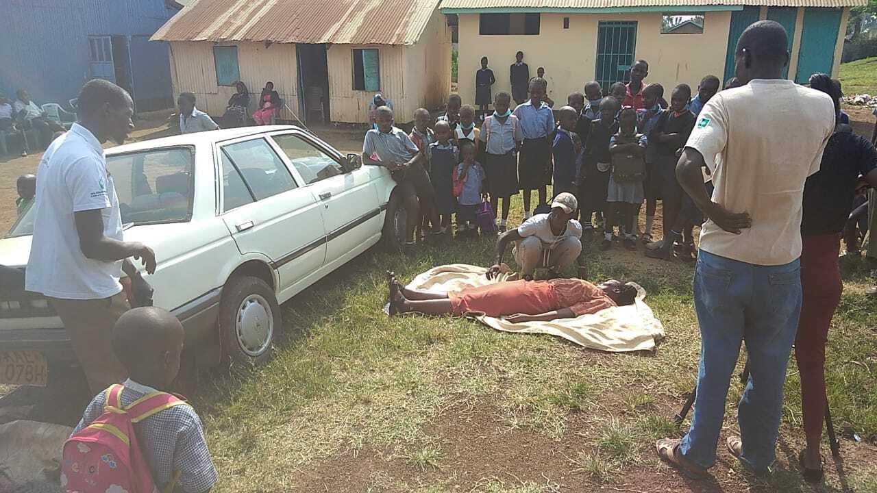 group of people looking at first aid training