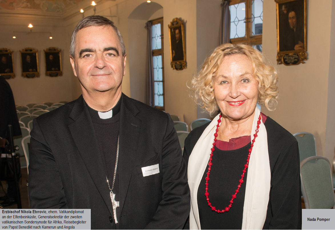 A man and a woman are standing next to each other in a room.