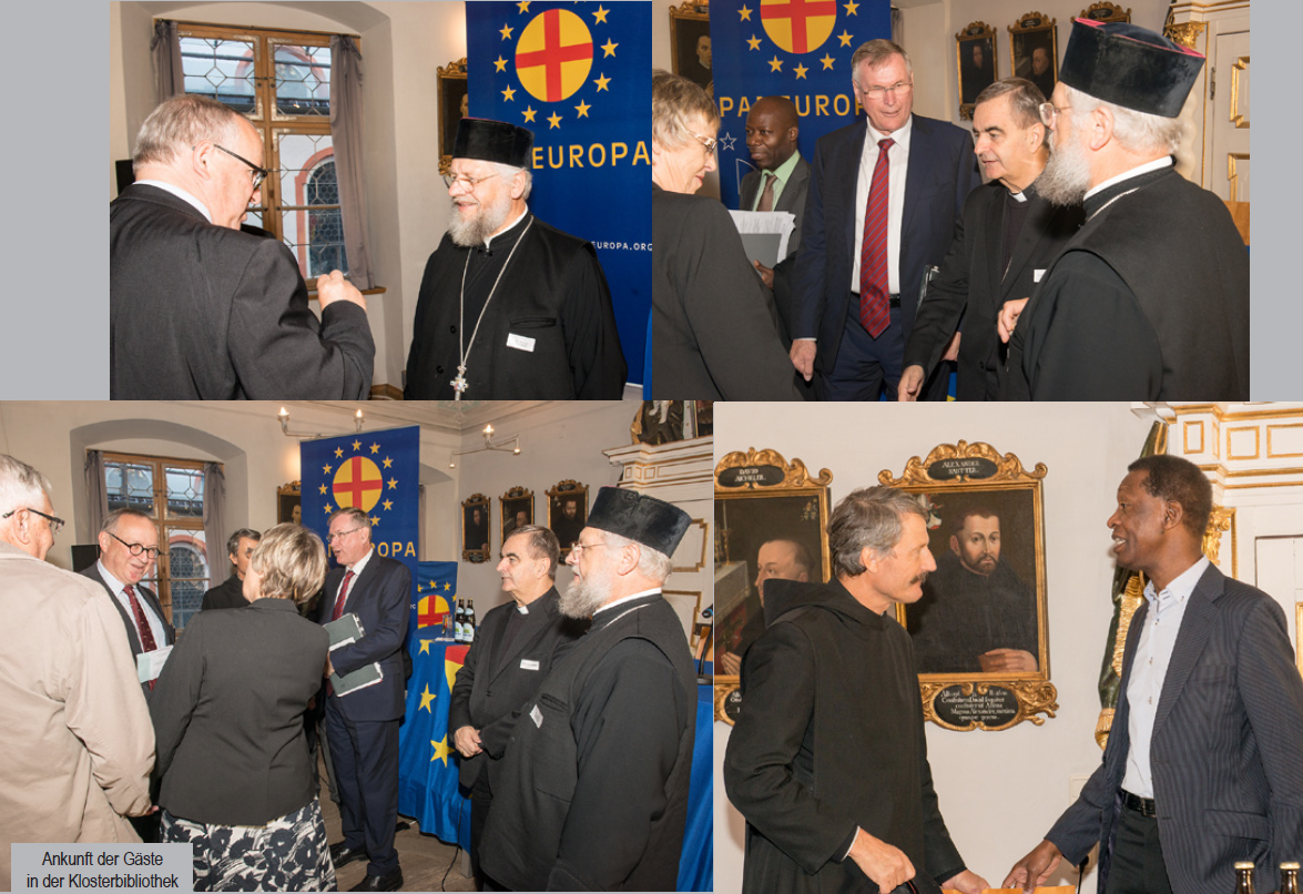 A group of men are standing in front of a sign that says europa