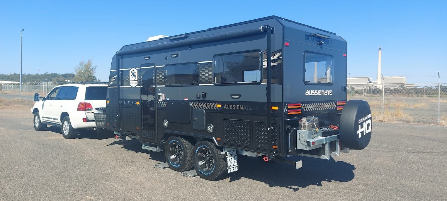 Black Shiny Caravan - Vehicle Weighing in Gladstone, QLD