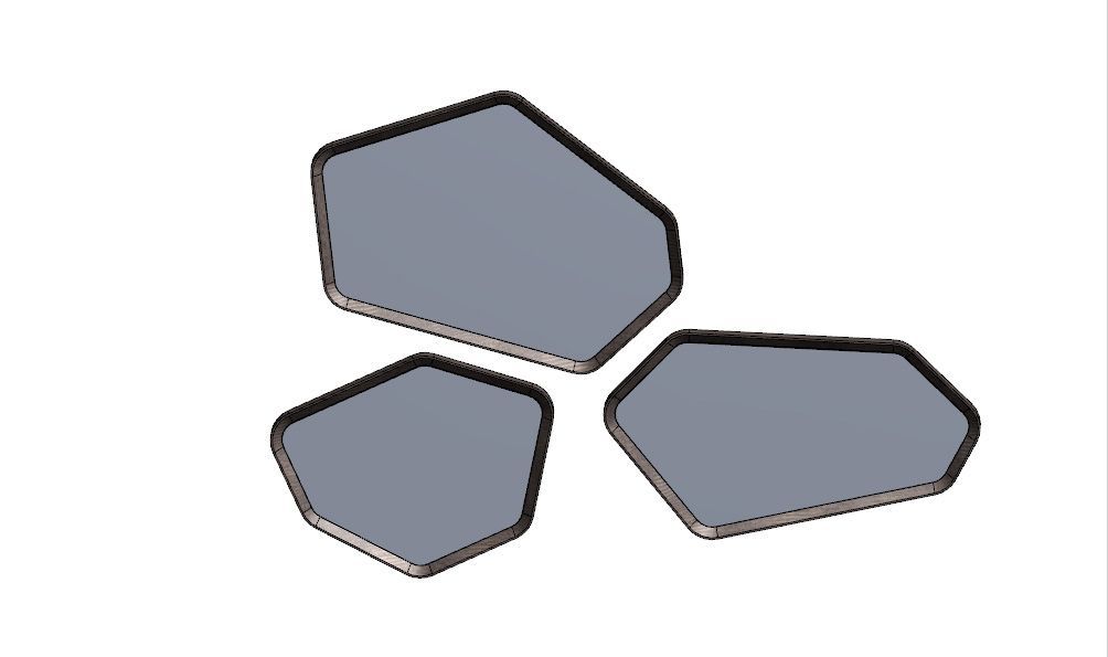 Três formas pentagonais irregulares, cinzas, com bordas pretas, aparentemente sobrepostas.