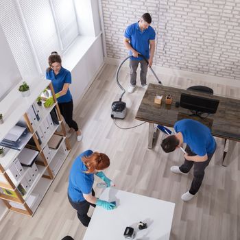 Maid Services — A Group Cleaning a Room in Florence, SC