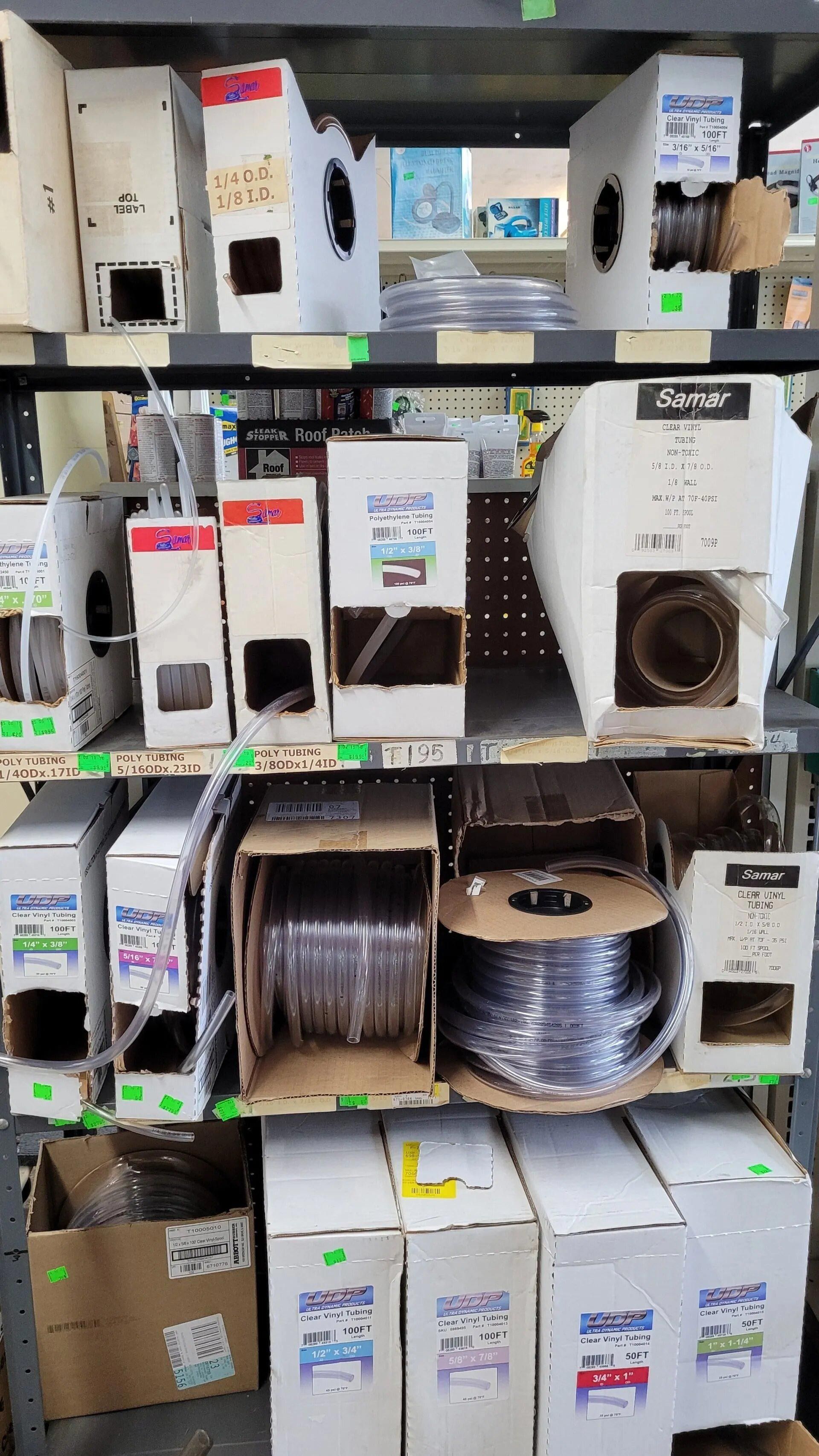 Shelf Filled With Boxes and Spools of Wire — Hattiesburg, MS — McElhaney Plumbing & Hardware Inc