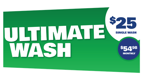a green sign that says ultimate wash '' on it