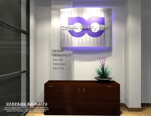 Reception area with dark wooden cabinet, illuminated sign with purple logo, and plant. Locations listed.