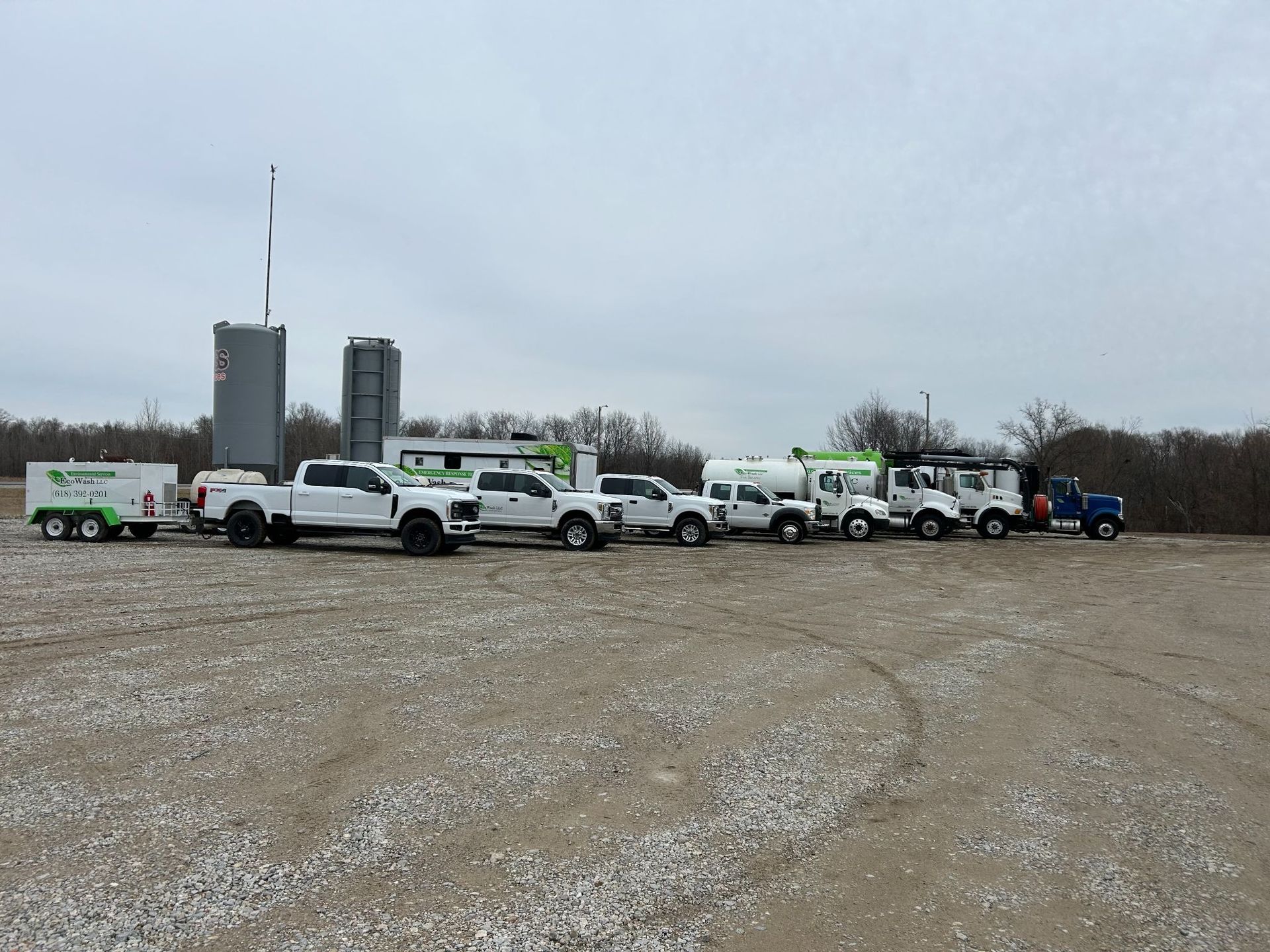 Two people at a trade show booth, 