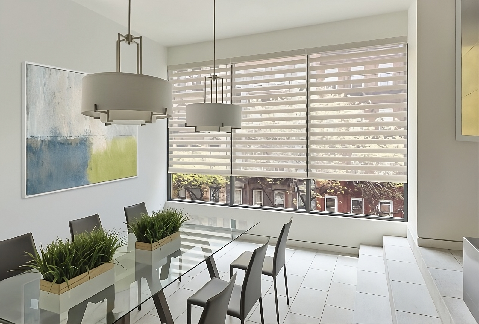 Hunter Douglas Designer Banded Shades on windows in a contemporary dining room with a neutral theme
