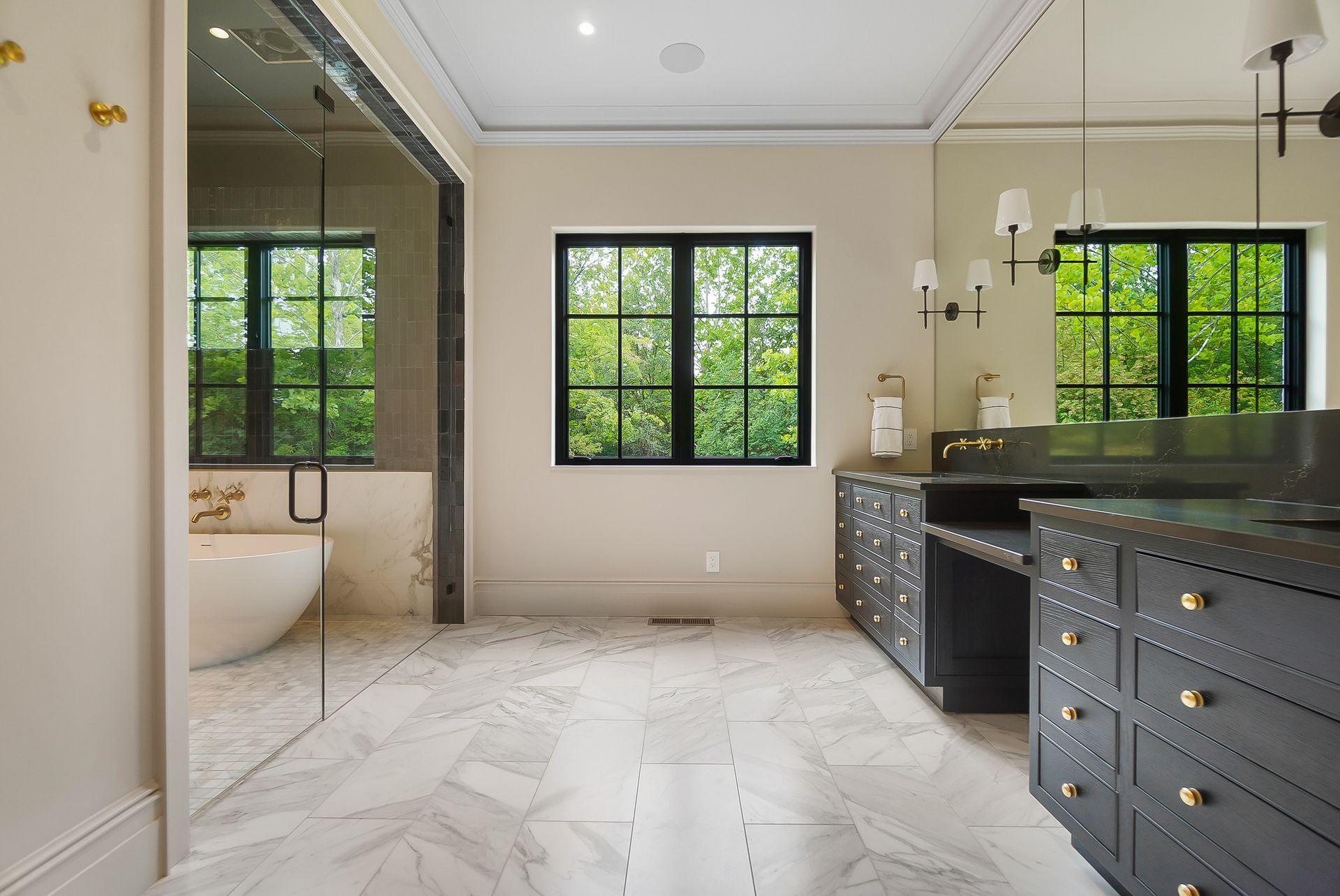 A kitchen with a large island and stools