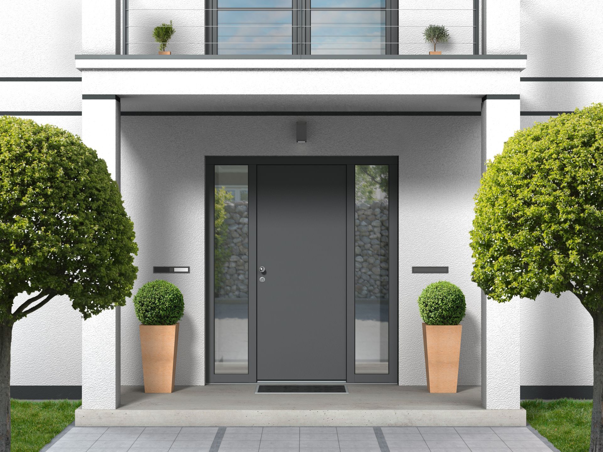 Gray front door with sidelights, two topiaries in pots, and matching door. Gray front door with sidelights, two topiaries in pots, and matching door.