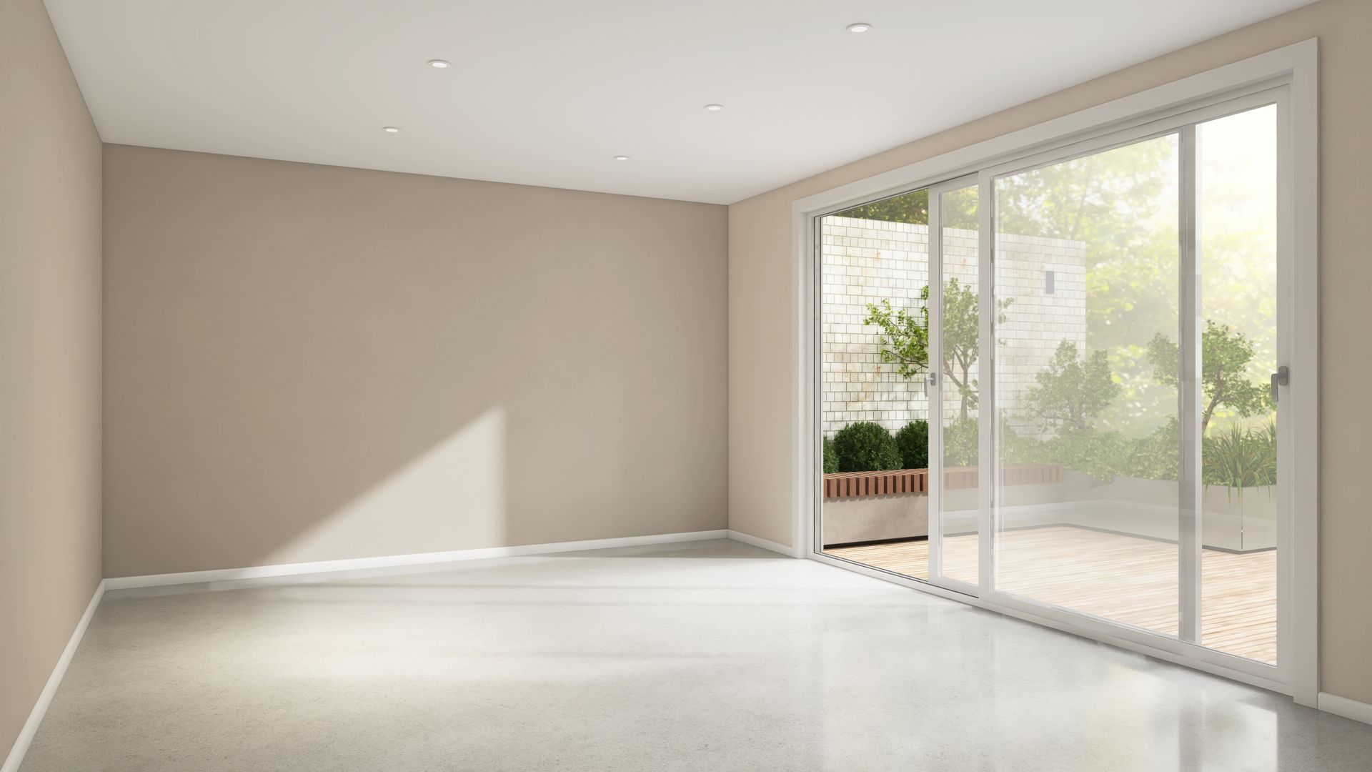 Empty room with sliding glass doors, beige walls, and a view of a patio. Empty room with sliding glass doors, beige walls, and a view of a patio.