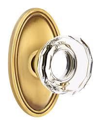 Brass oval door plate with faceted crystal doorknob. Brass oval door plate with faceted crystal doorknob.