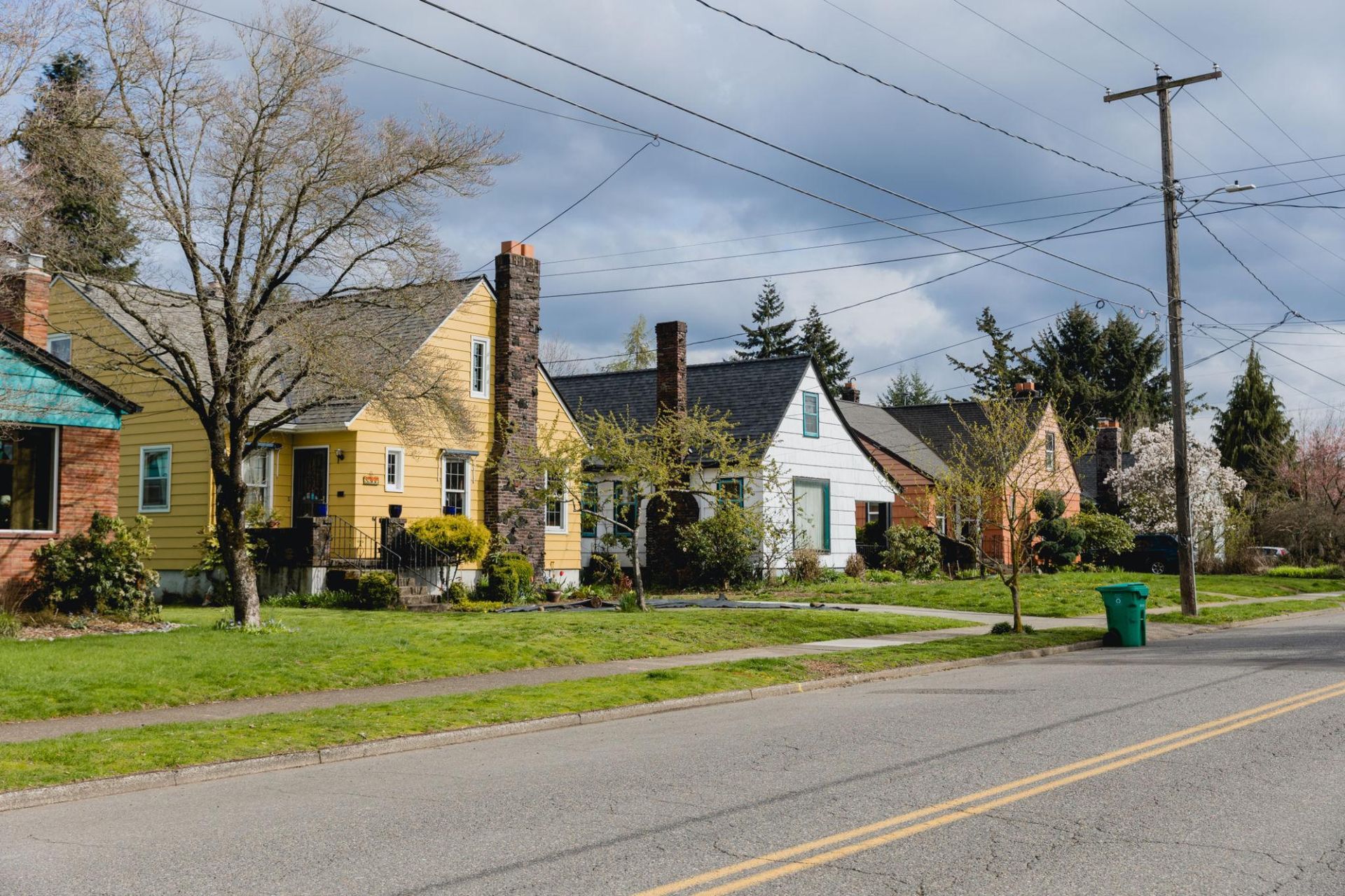 Residential home exterior showing minor structural stress after earthquake