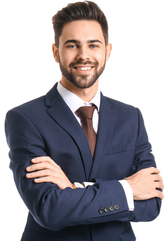 A man in a suit and tie is standing with his arms crossed.