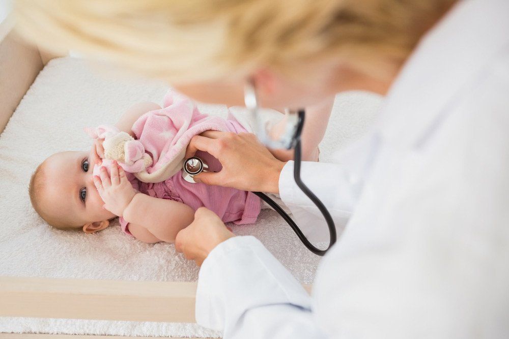 Beautiful Cute Baby Girl With Doctor With Stethoscope — Deception Bay Doctors In Deception Bay, QLD