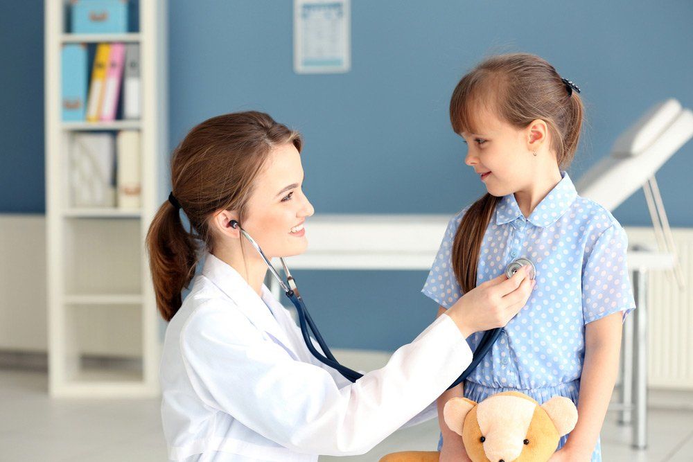 Doctor Examining Girl With Stethoscope — Deception Bay Doctors In Deception Bay, QLD